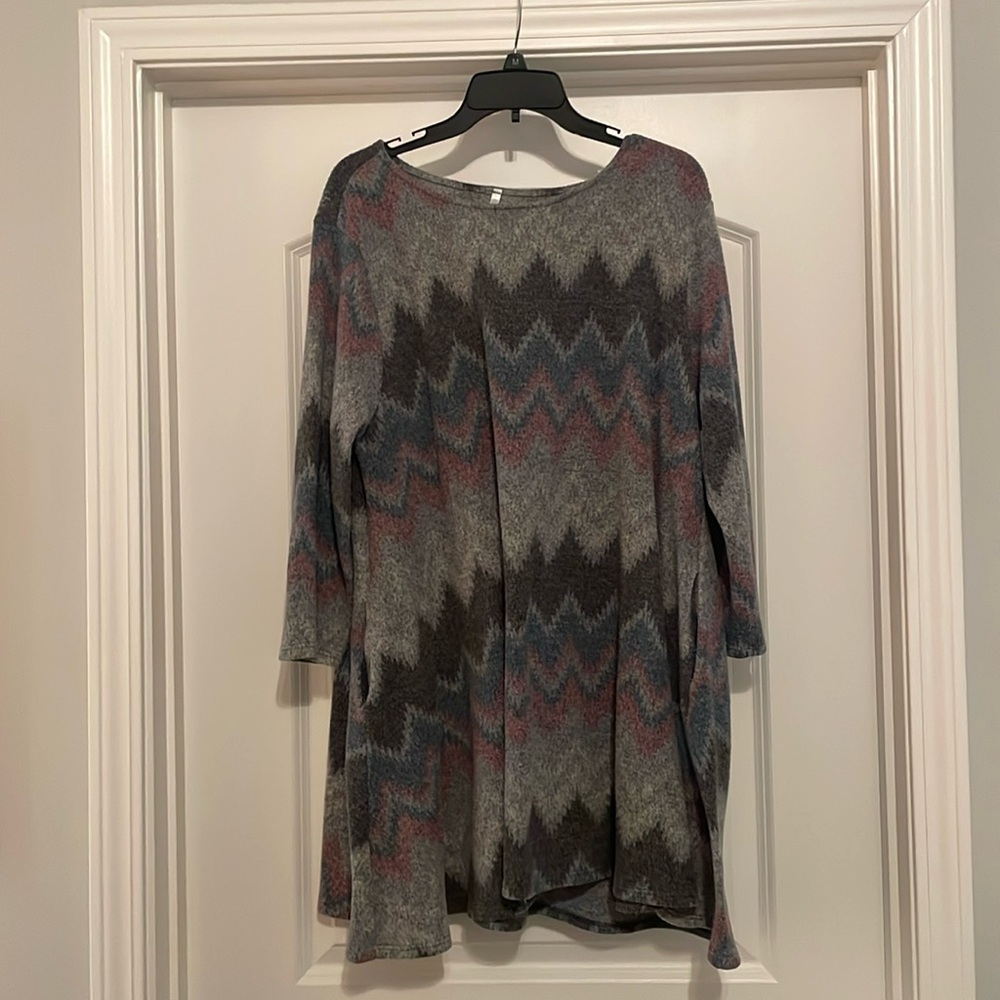 Beautiful, soft A-line sweater. Aztec print